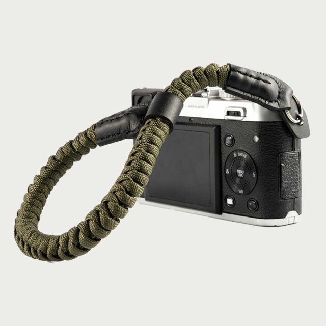Grønn håndleddsfeste i paracord for kamera